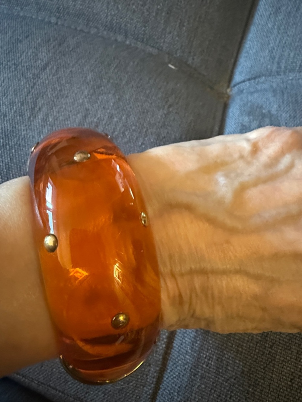 Hinged Studded Resin Bangle Bracelet Featuring a Translucent Amber Color. - Picture 2 of 5
